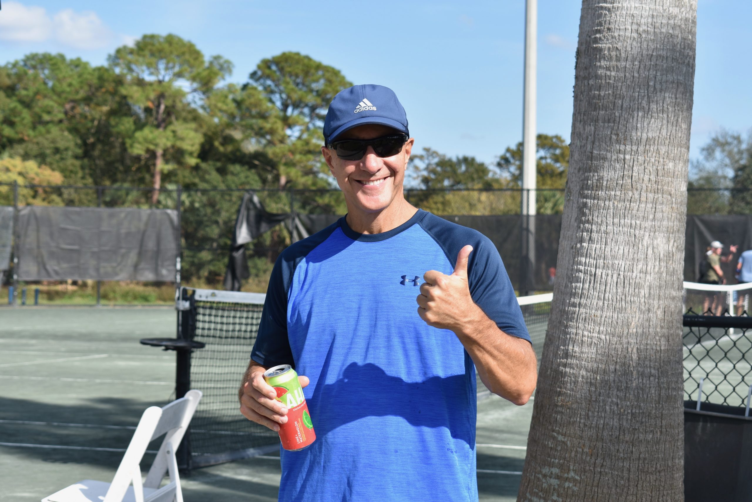 Tennis Fun-Raiser participant gives a thumbs up